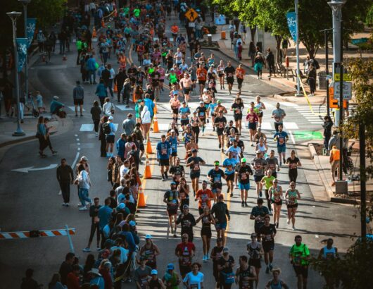The image of people in city running competition