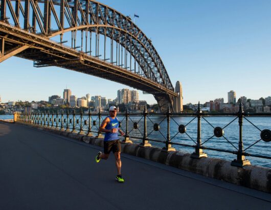 The image of the runner with Sydney Harbour Bridge on the background