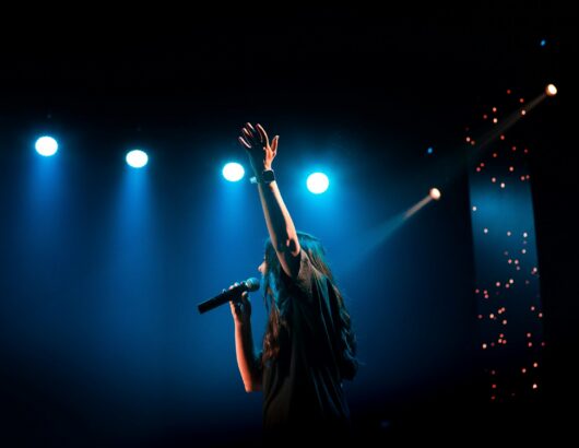 The image of a singer on the stage