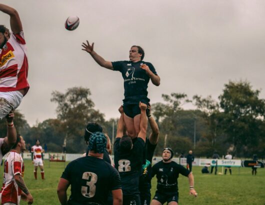 The image of rugby players on the field